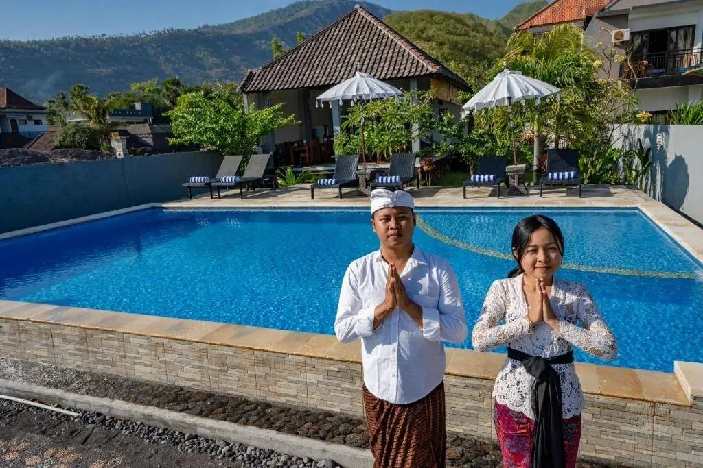 The pool and garden at the dive resort in Amed, with a warm Balinese welcome