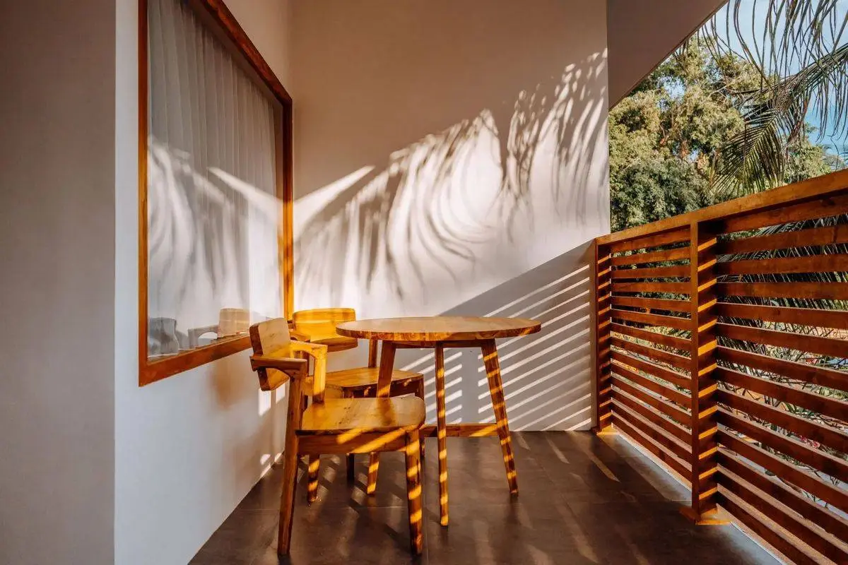 A quiet balcony room with garden views