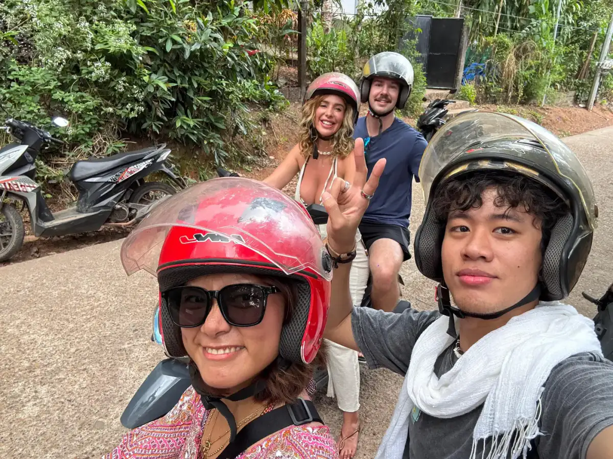 Guests on a scooter day exploring the island